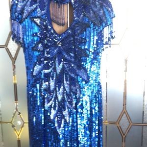 Dress, handbag, shoes, earrings.